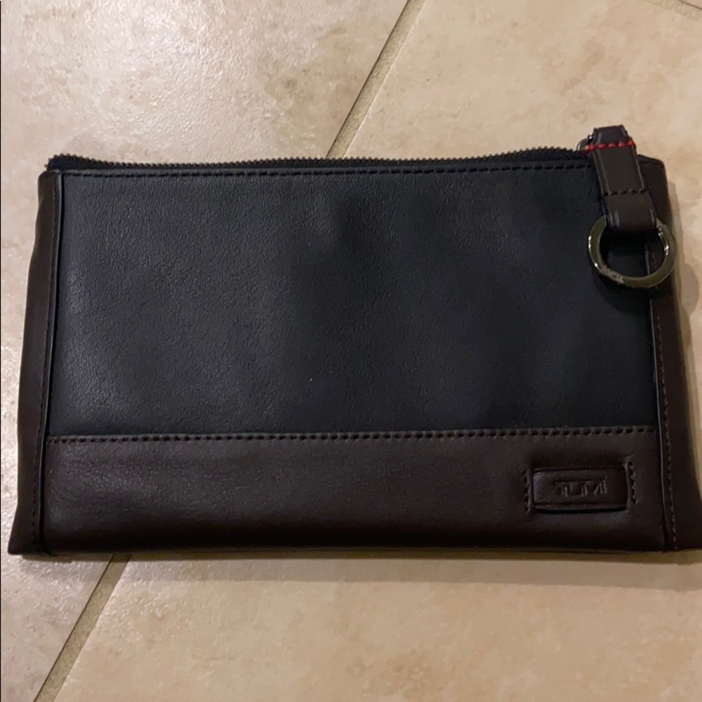 Authentic brand new Tumi clutch